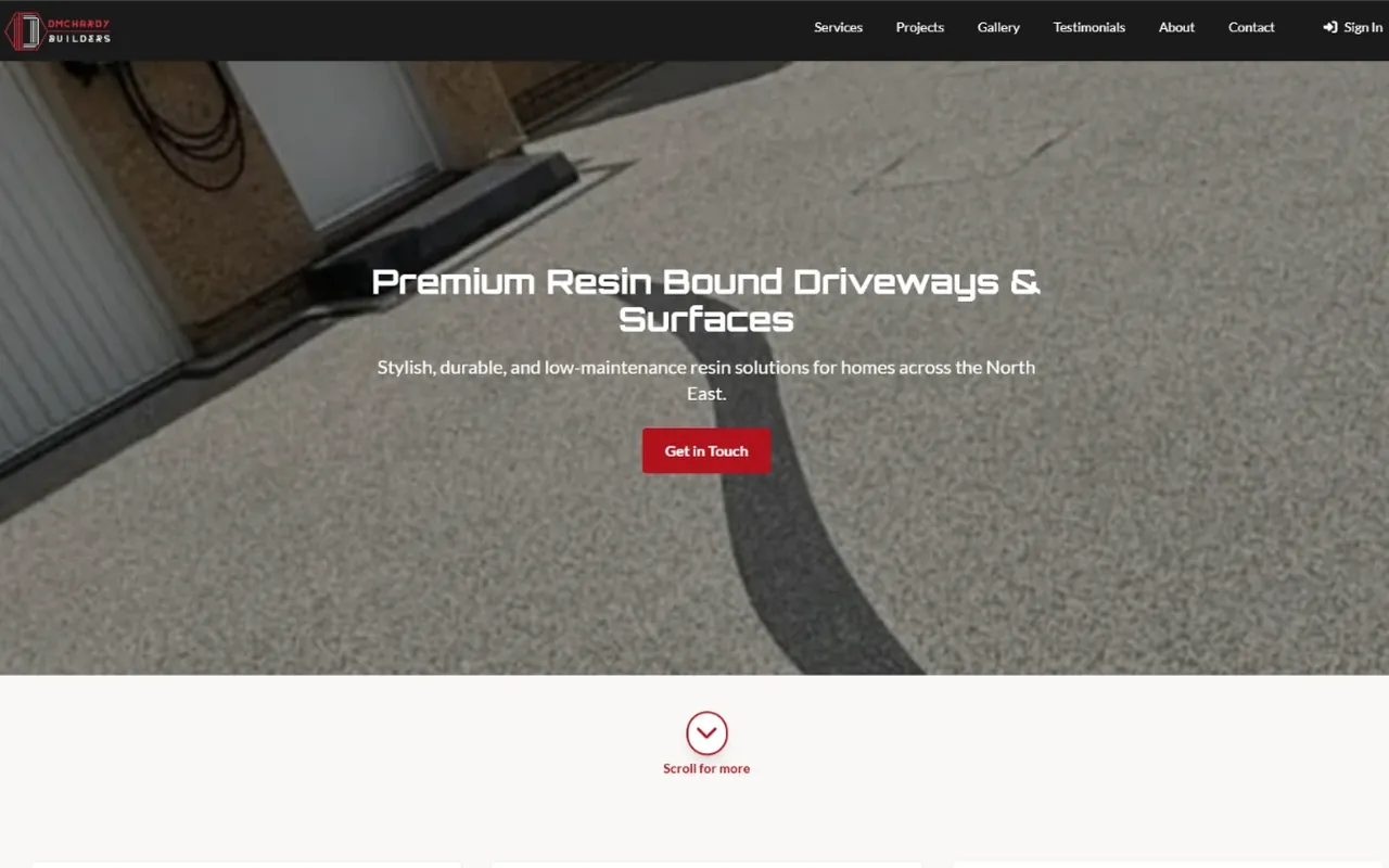 DMcHardy Builders homepage, with a resin bound driveway hero and a Get in Touch button